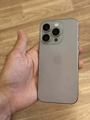 apple iphone 12: IPhone 15 Pro, 256 GB, Natural Titanium, Simsiz şarj — 1