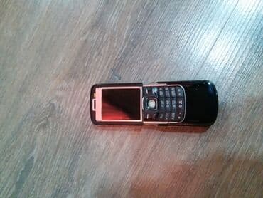 Apple iPhone: Qara rəngli sürüşdürülən düyməli mobil telefon Xüsusiyyətlər: - — 8