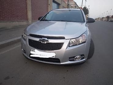 Chevrolet Cruze RS – gümüş rəng, sedan kuzov(5501) təcili pul lazımdır