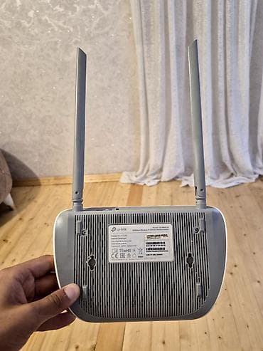 pristavka smart tv: TP-Link TD-W8961N ADSL2+ Wi‑Fi router - Model: TD-W8961N (300Mbps — 2