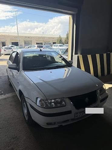 07 kuzası: Model: Iran Khodro Samand (ağ sedan) Xüsusiyyətlər: - Kuzov: 4 qapılı — 2