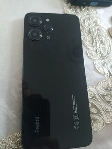 Məhsul: Redmi smartfon n Xüsusiyyətlər: - Rəng: Qara, parlaq arxa