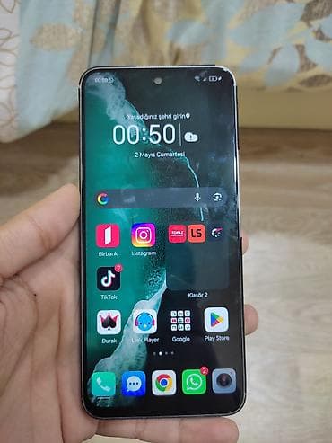 tank telefon qiymeti: Smartfon – böyük tam ekranlı, ön kamerasi ekranın mərkəzində — 1