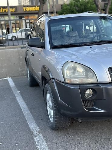 Hyundai Tucson: 2 л | 2005 г. Кроссовер — 6