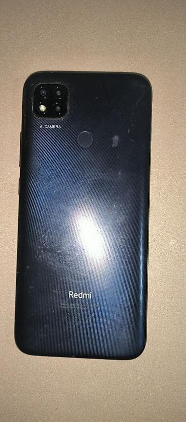 islenmis noutbuklar: Redmi 9C, 128 GB, rəng - Qara, Barmaq izi — 1