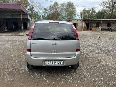опель зафира а: Opel Meriva, gümüşü rəng, 5 yerlik kompakt MPV. Xarici: - Gümüş — 2