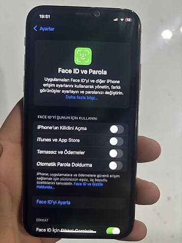 divarda televizor fiqurlari: IPhone Xs, 64 GB, Qızılı, Face ID — 7