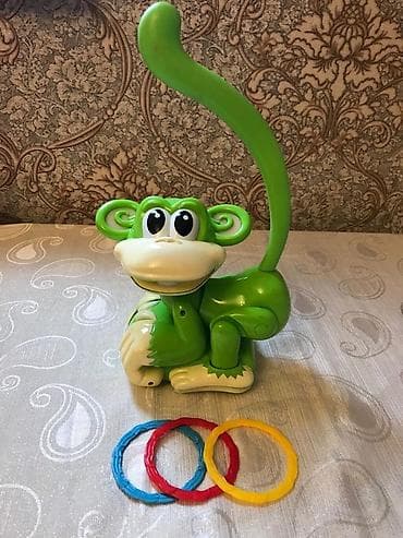 Musiqili əyləncəli diqqət cəmləmək üçün oyuncaq. Meymun gezir baş ve