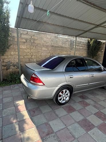 09 matoru: Nissan Sunny: 1.6 l | 2008 il Sedan — 6