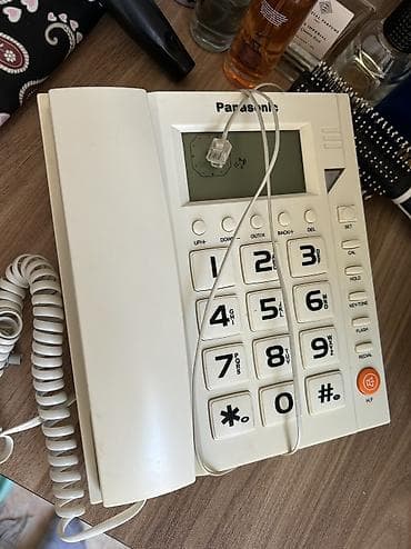 nokia zeng sesi: Stasionar telefon Panasonic, Simli — 1