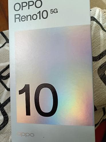 philips xenium 9@9d: Oppo Reno10, İki sim kartlı — 1