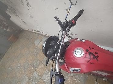 iki teker motor: Məhsul: Qırmızı rəngli yol motosikleti Xüsusiyyətlər: - Korpus — 4