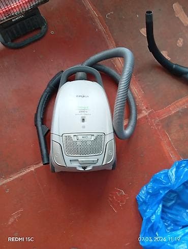2000W gücündə EUROLux tozsoran. Ağ rəngli gövdəsi və möhkəm şlanqı ilə