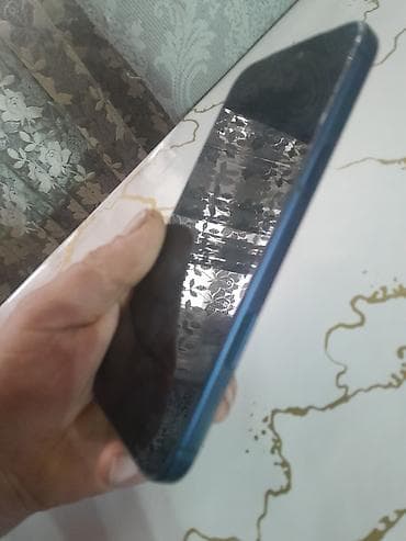 star x mini 1: IPhone 14 Pro Max, Mavi, Face ID — 3