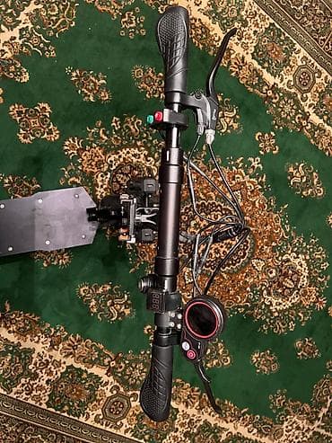 Elektrik nəqliyyatı: Elektrik skuter – oturacaqlı, güclü asqılı və geniş platformalı, 60 km — 4