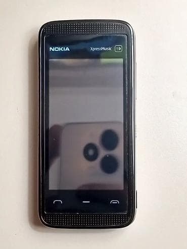dark souls disk: Nokia 5530 Xpressmusic, 64 GB, rəng - Qara, Sensor — 2