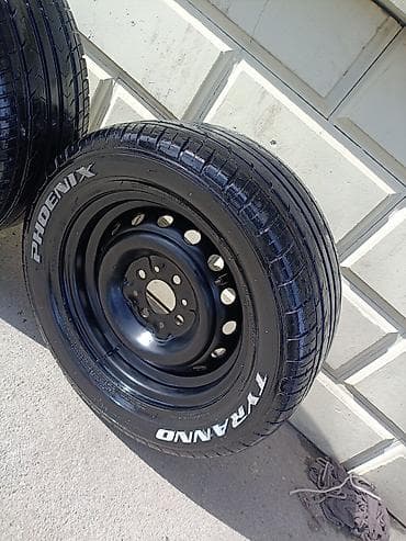 Digər nəqliyyat: Şin Roadstone 215 / 50 / R 13 — 5