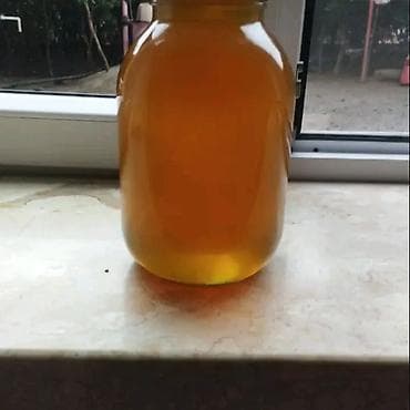 Təbii bal – şüşə qabda Məhsul təsviri: - Şəffaf şüşə bankada