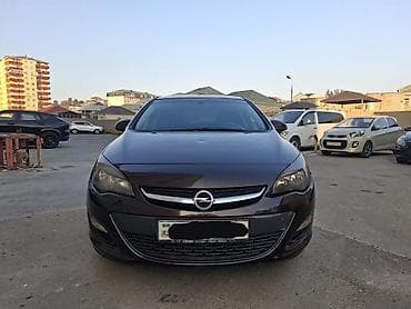 Motonəqliyyat: Opel Astra J hatchback - Kuzov: 5 qapılı hatchback, tünd qəhvəyi/qara — 1