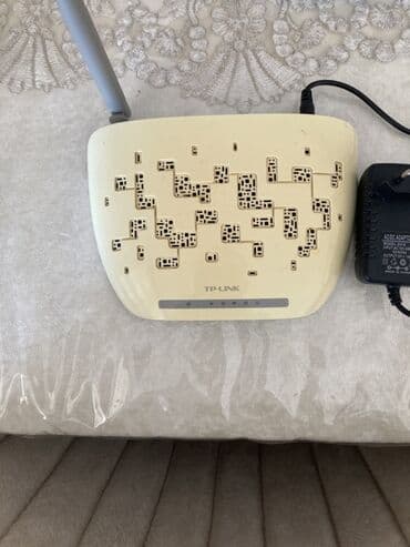 ucuz planşet: TP-Link şirkətinin simsiz marşrutlaşdırıcısı. O, Wi-Fi şəbəkəsini — 1