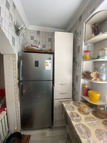 ucuz bina evləri: Yasamal rayonu (77 dayanacağın sonu) yeni tikili 22 mertebeli binanın — 12