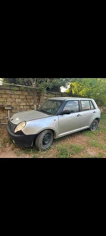 mini karavan: Lifan 320 hatchbek - Kuzov: 5 qapılı kompakt hatchbek, gümüşü rəng — 4