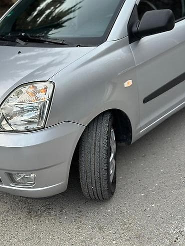 ninja h2r qiymeti: Kia Picanto, gümüşü rəng, 5 qapılı heçbek. Avtomobil çox ekanom va — 4