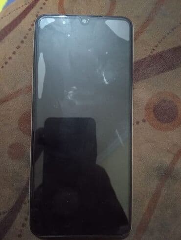 redmi a 5: Məhsul: Redmi smartfon Xüsusiyyətlər: - Korpus: Gümüşü rəngli arxa — 2