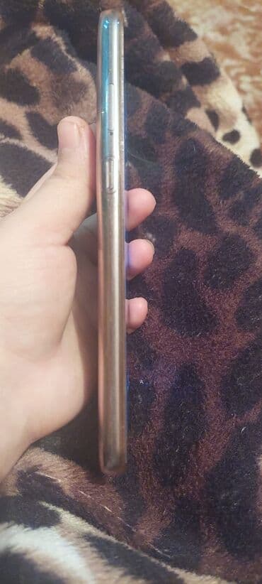 xiaomi 15 qiyməti: TCL smartfon - Ekran: damla‑notch ön kamera kəsiyi olan tam ekran; — 4