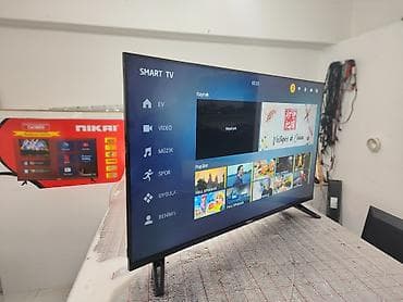 mini kondisener: TOKLA Smart TV – geniş funksiyalı televizor - Ekran: Təxminən 40–43 — 2