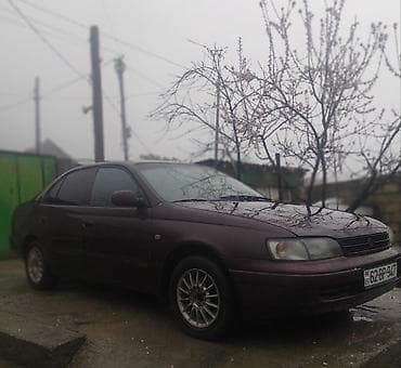 avto rullar: Toyota Carina E: 2 l | 1994 il Sedan — 5