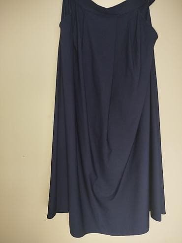 Tünd göy rəngdə, klassik kəsimli uzun ətək. - Model: A-kəsim, axıcı
