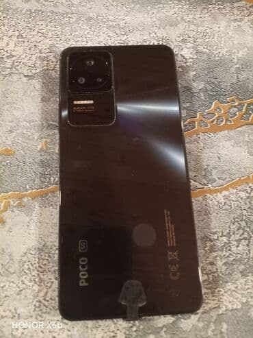 xiaomi 10c: Xiaomi 14, 256 GB, rəng - Qara, 
 Düyməli, Barmaq izi, İki sim kartlı — 2