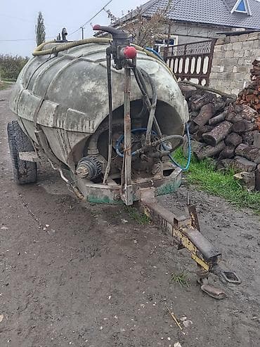 Kənd təsərrüfatı üçün qoşqu tipli bağ-sahə püskürdücüsü - Traktorla