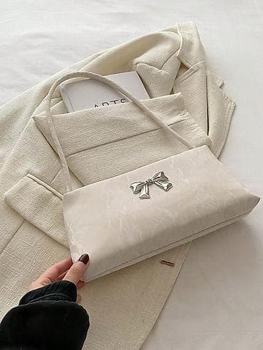 Zərif dizaynlı çiyin çantası - Rəng: krem/ivori - Forma: uzun