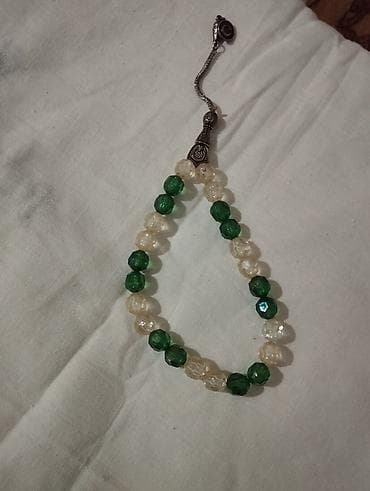 Eynəklər: Məhsul: Təsbeh dəsti (4 ədəd) Təsvir: - Ağ təsbeh: Oval-silindrik — 8