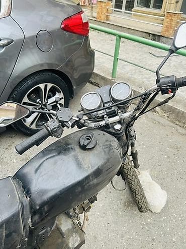 Moped/motosiklet – şəhər içi qısa məsafələr və yük daşıma üçün praktik