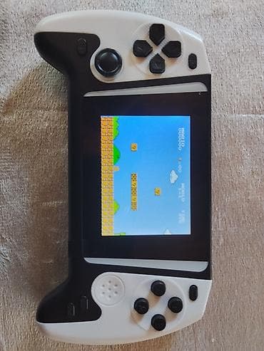 predator notebook qiymeti: Portativ retro oyun konsolu - Korpus: ağ-qara, ergonomik “gamepad” — 1