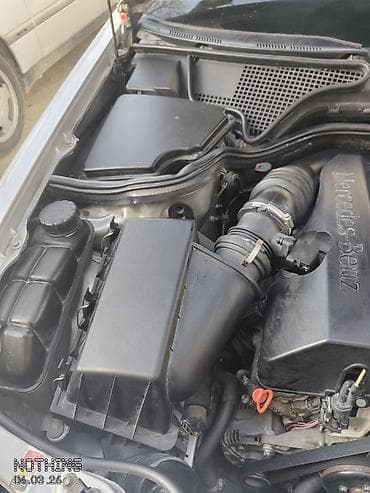 Mercedes-Benz E-Class (W210), gümüş rəng. Xarici: - Klassik W210 — 5