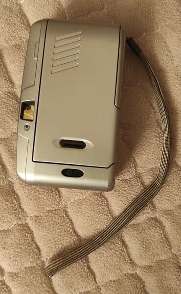 Видеонаблюдение: Köhnə o vaxtların dəbdə olan lentli foto aparatı yaxşı normal işlək — 2