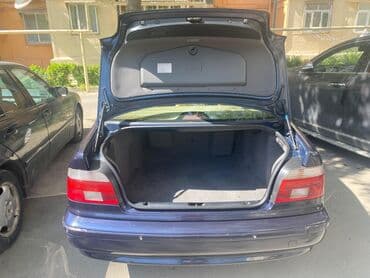 aston martin db7 5.9 at: BMW 5 series: 2.5 l | 2000 il Sedan — 11