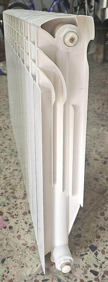 Alüminium radiator – seksiyalı, su əsaslı mərkəzi isitmə sistemləri — 1