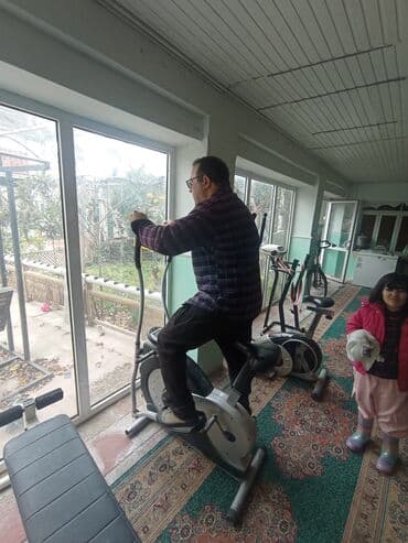 Elliptik velotrenajor - Tam bədən üçün kardio məşqi: həm pedallama