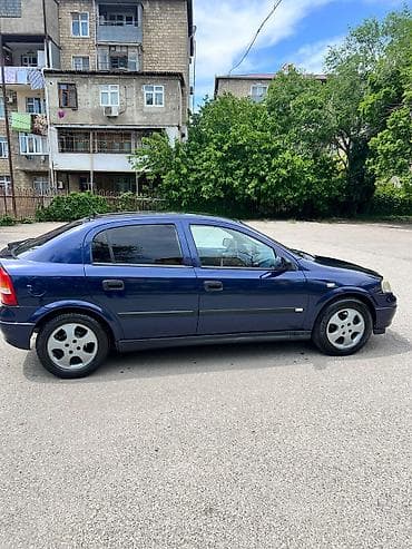 dt 75 traktor satisi: Opel Astra: 1.6 l | Sedan — 5