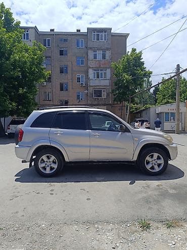 traktor belarus 1221: Toyota RAV4: 2 l | 2003 il Universal — 1