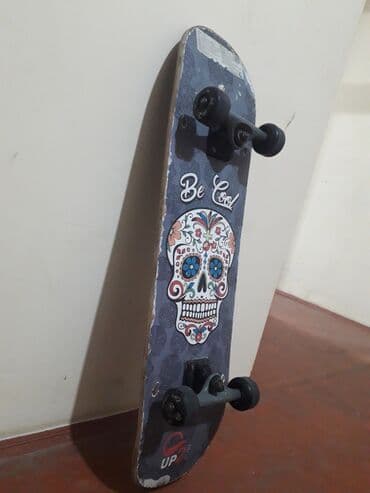 Skeytboard satilir bir balaca kenari qiriqdi sekilde gorunur, qalan — 4
