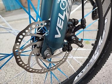velosiped ural: Dağ velosipedi – 24” təkərlər, enli protektorlu şinlər. Rəng: tünd — 5
