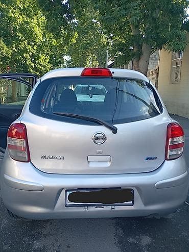 mini cooper 2009: Nissan March: 1.2 l | 2012 il — 3