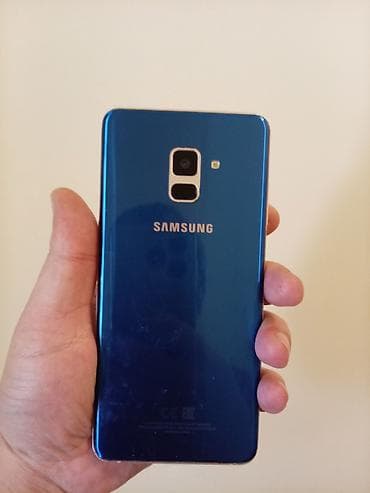 Техника и электроника: Samsung Galaxy A8 2018, 64 ГБ, цвет - Голубой, Отпечаток пальца, Сенсорный, Две SIM карты — 1