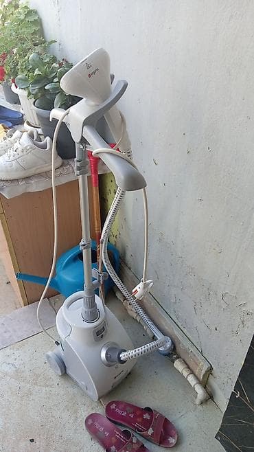 utulər: Paltar üçün buxarlı ütüləmə aparatı satılır. Şaquli tipli steamer — 1